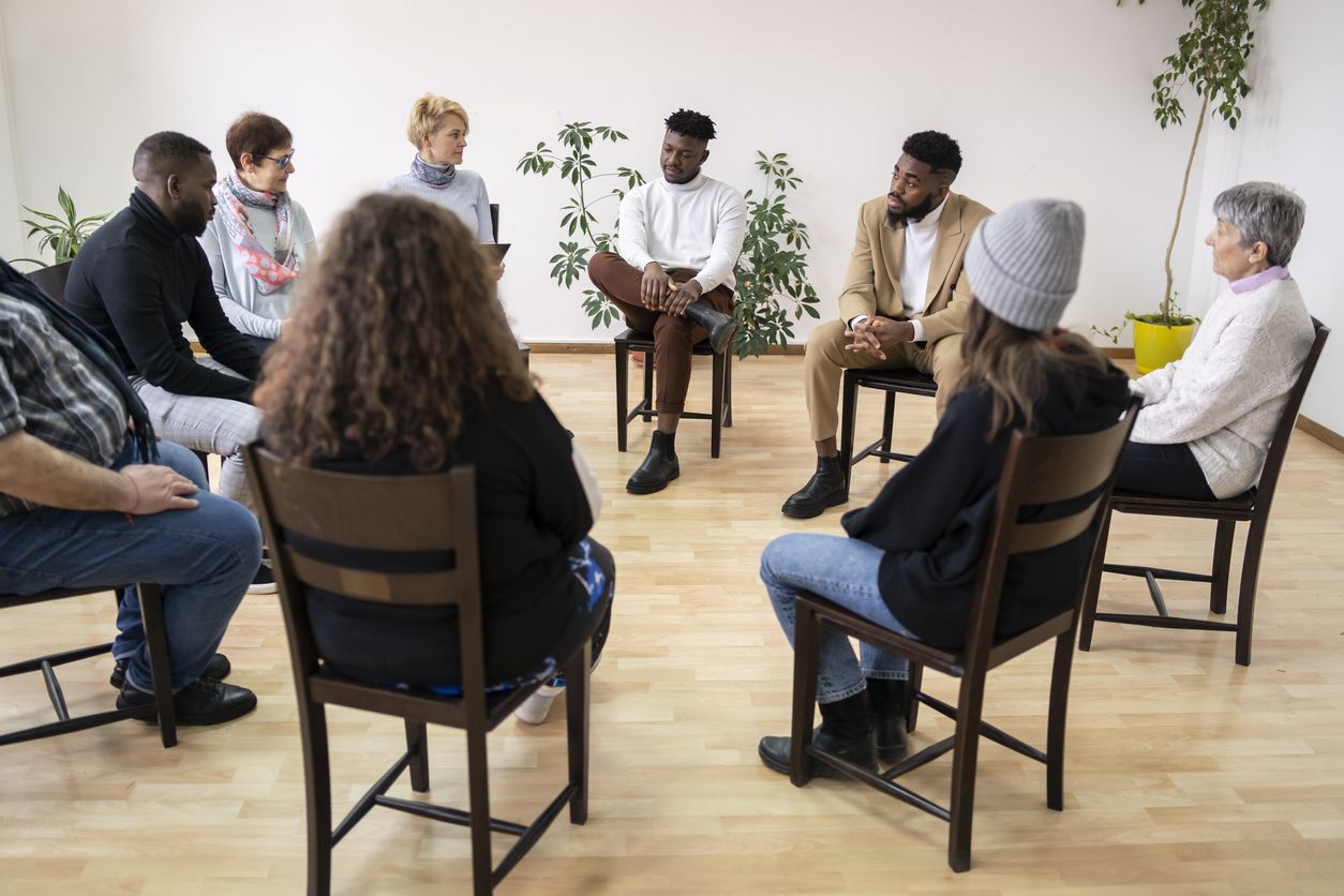 Having a discussion in a mental health meeting